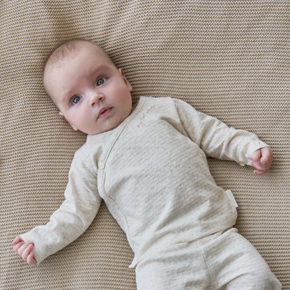 Little Dutch Baby im Wickelshirt Beige mit feiner Struktur und my first safari Stickerei