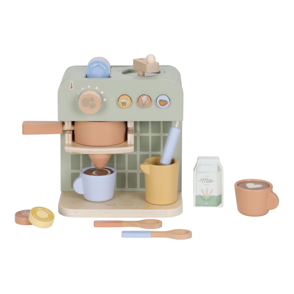 Grüne Little Dutch Kaffeemaschine mit hellblauer Tasse unter dem Auslauf, Milchtüte und weiterem Spielzubehör.
