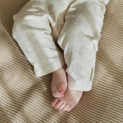 Little Dutch Babyleggings Beige mit elastischem Bund für einen bequemen Sitz.
